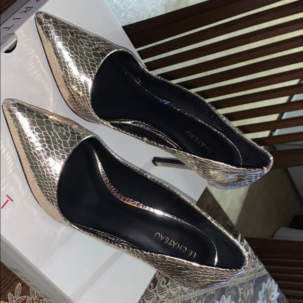 high heel shoes on gold